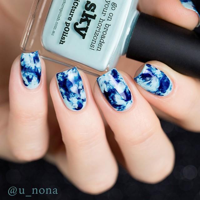blue watermarble nails