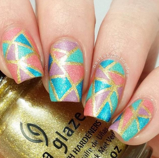 A touch of gold by @nailsbymercedes using China Glaze 'Mingle with Kringle' and 'So Blue Without You'!
